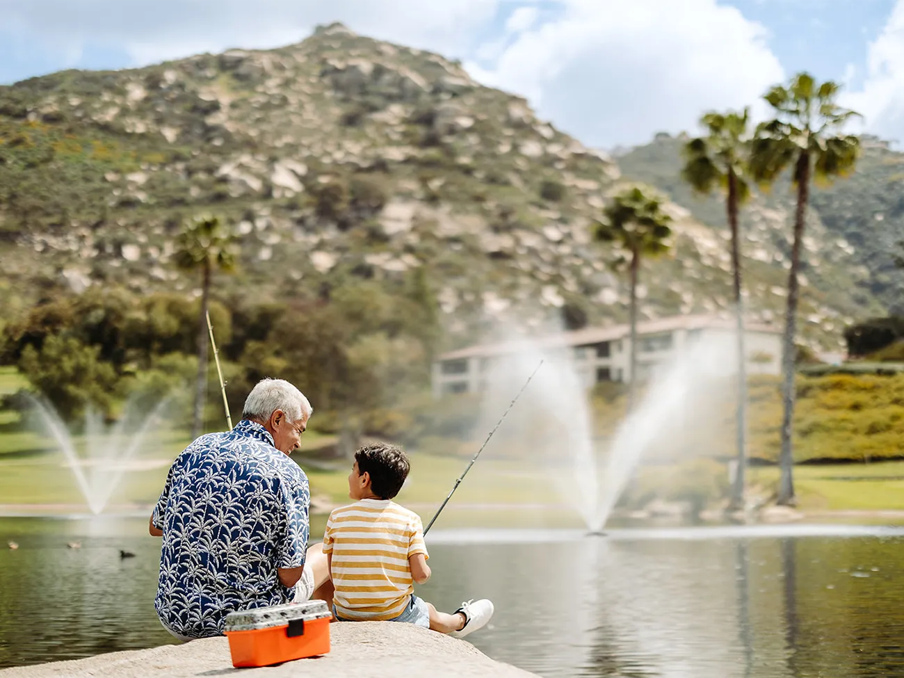 Grandfather and grandson fishing at The Welk