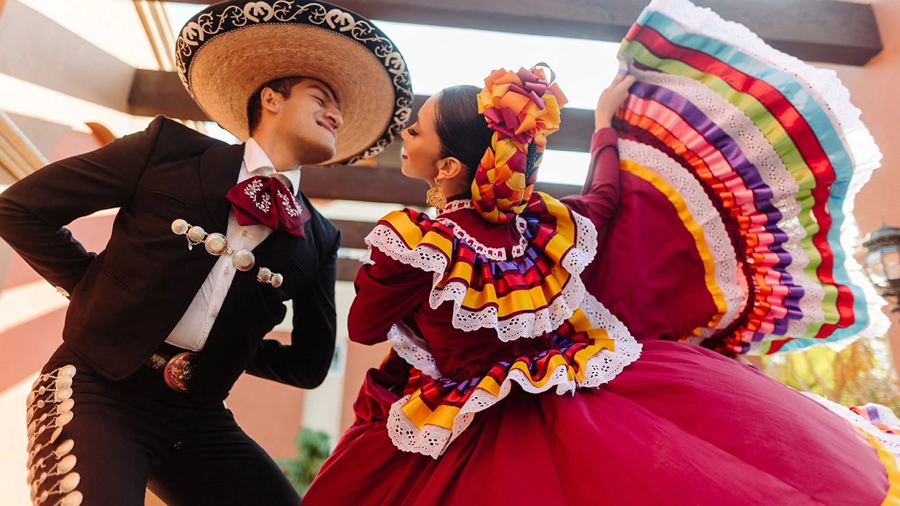 A pair of Mexican folk dancers put on a show in traditional garb