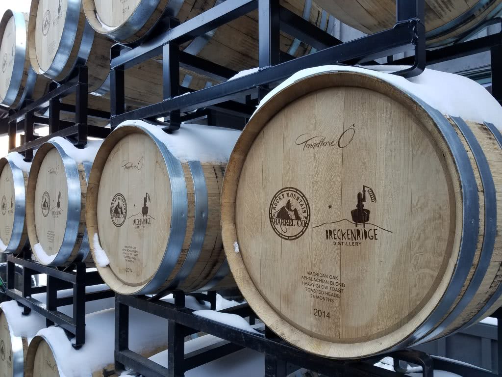 Barrels in the snow at Breckenridge Distillery Restaurant