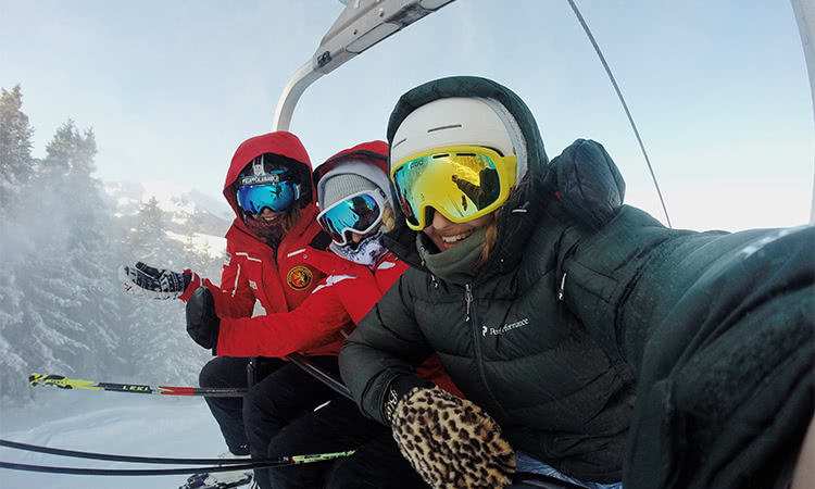 Selfie on the lift while skiing in Tahoe.