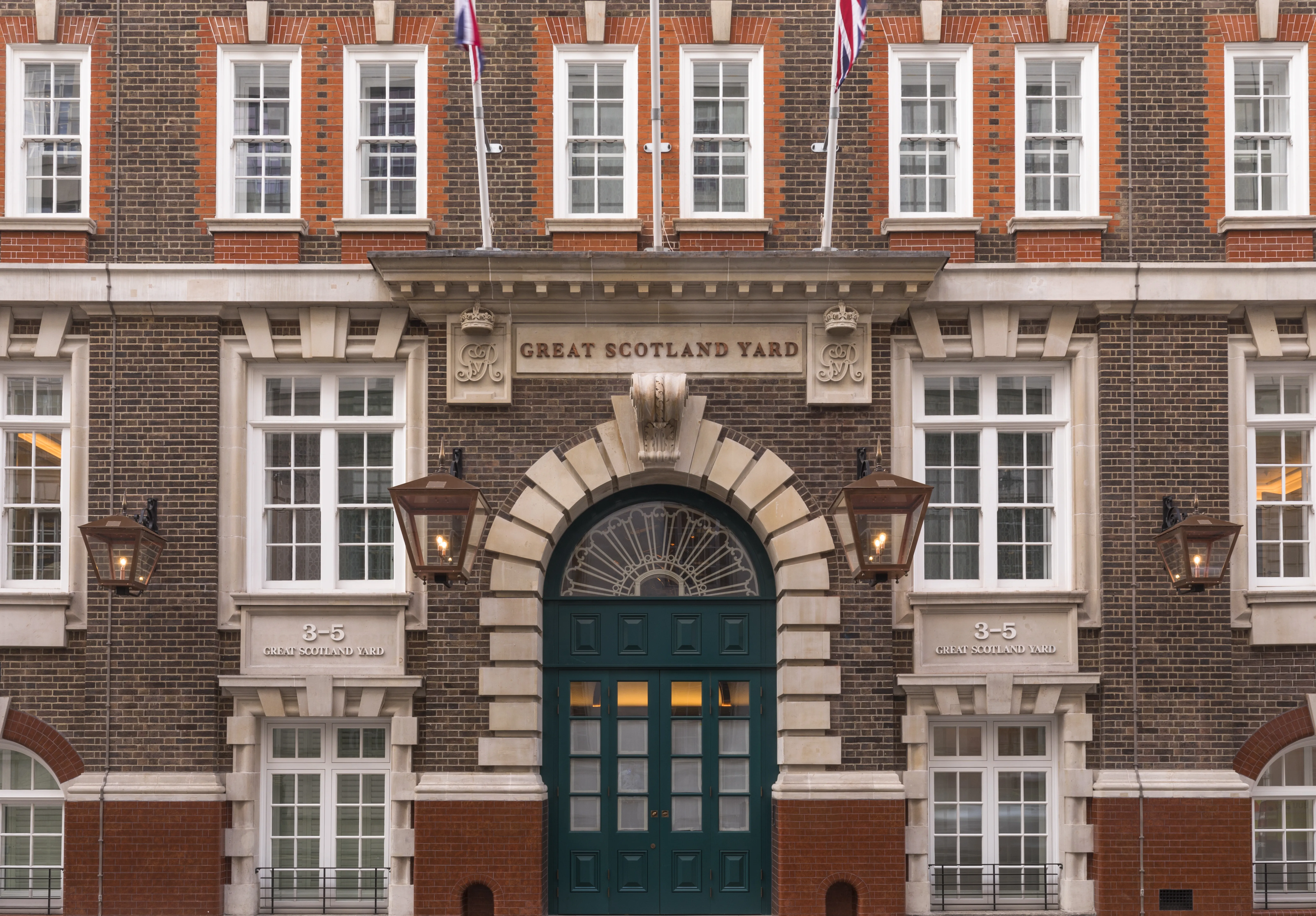 Brick facade and entrance of Great Scotland Yard Hotel.