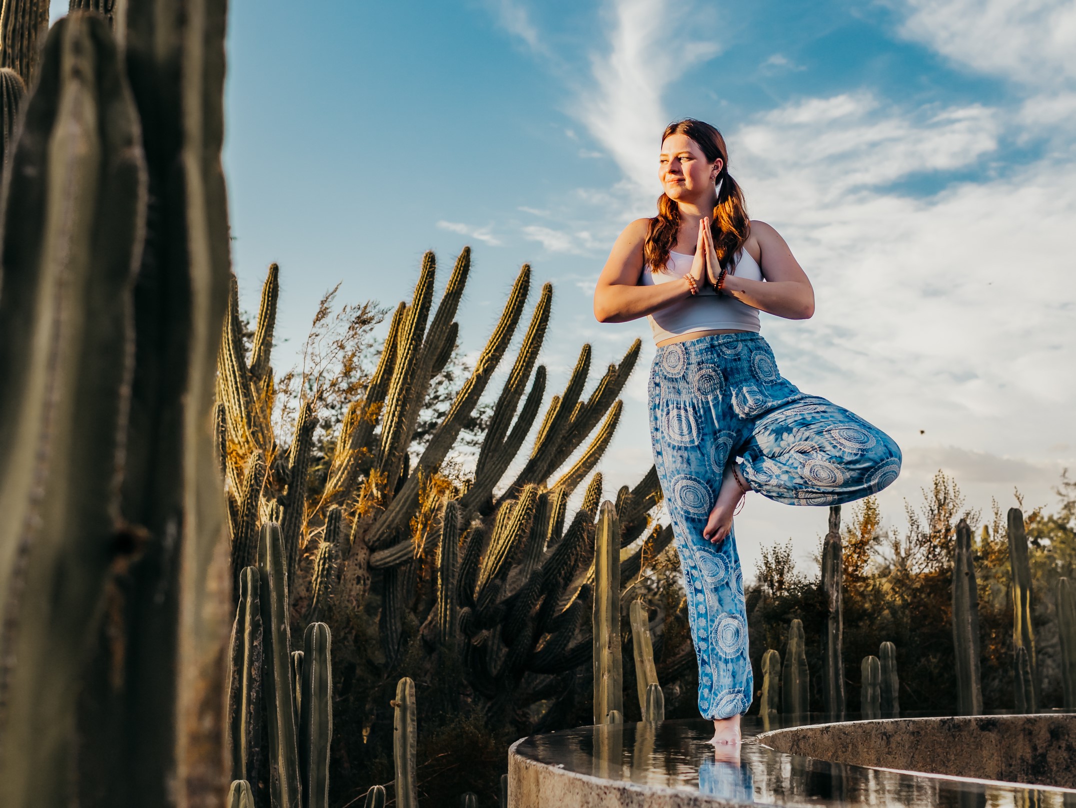 A young woman practices yoga.