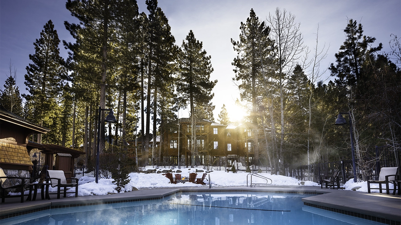 The pool at Lake Tahoe High Sierra Lodge steams in the cold winter air