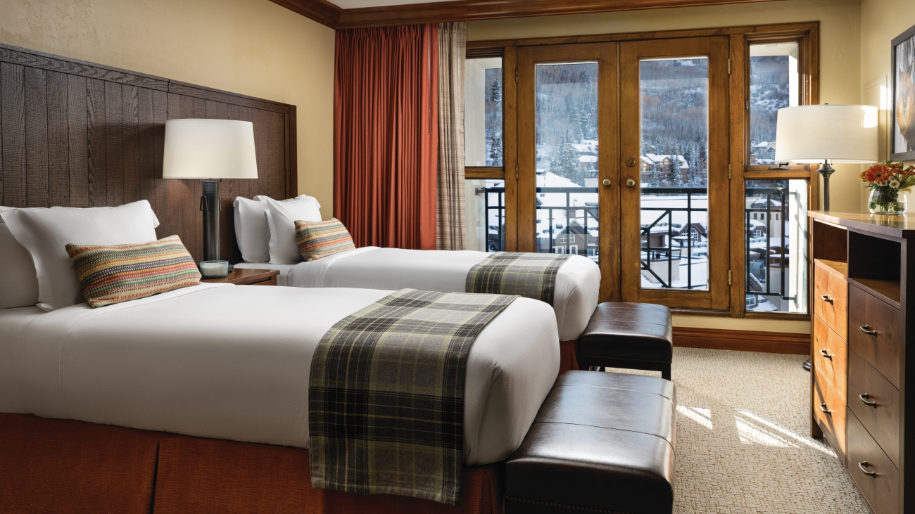 Villa bedroom with a scenic mountain view