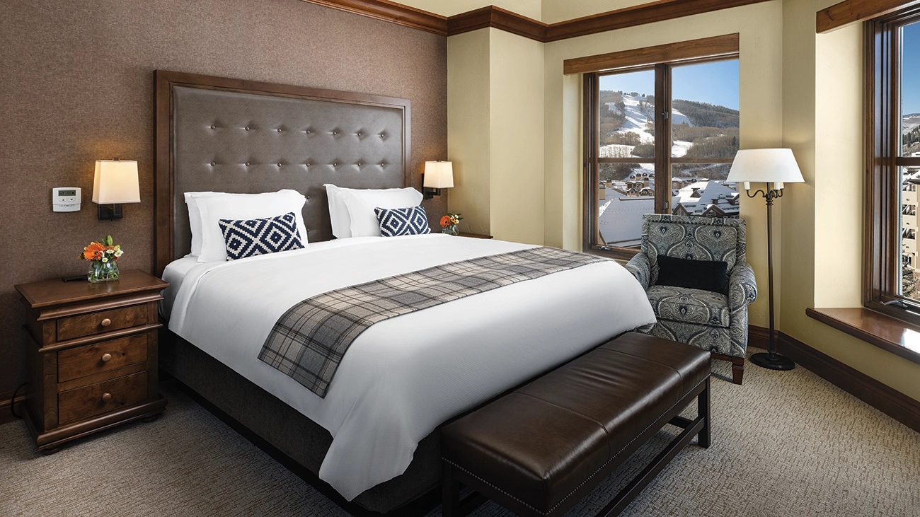 Villa bedroom with a scenic mountain view
