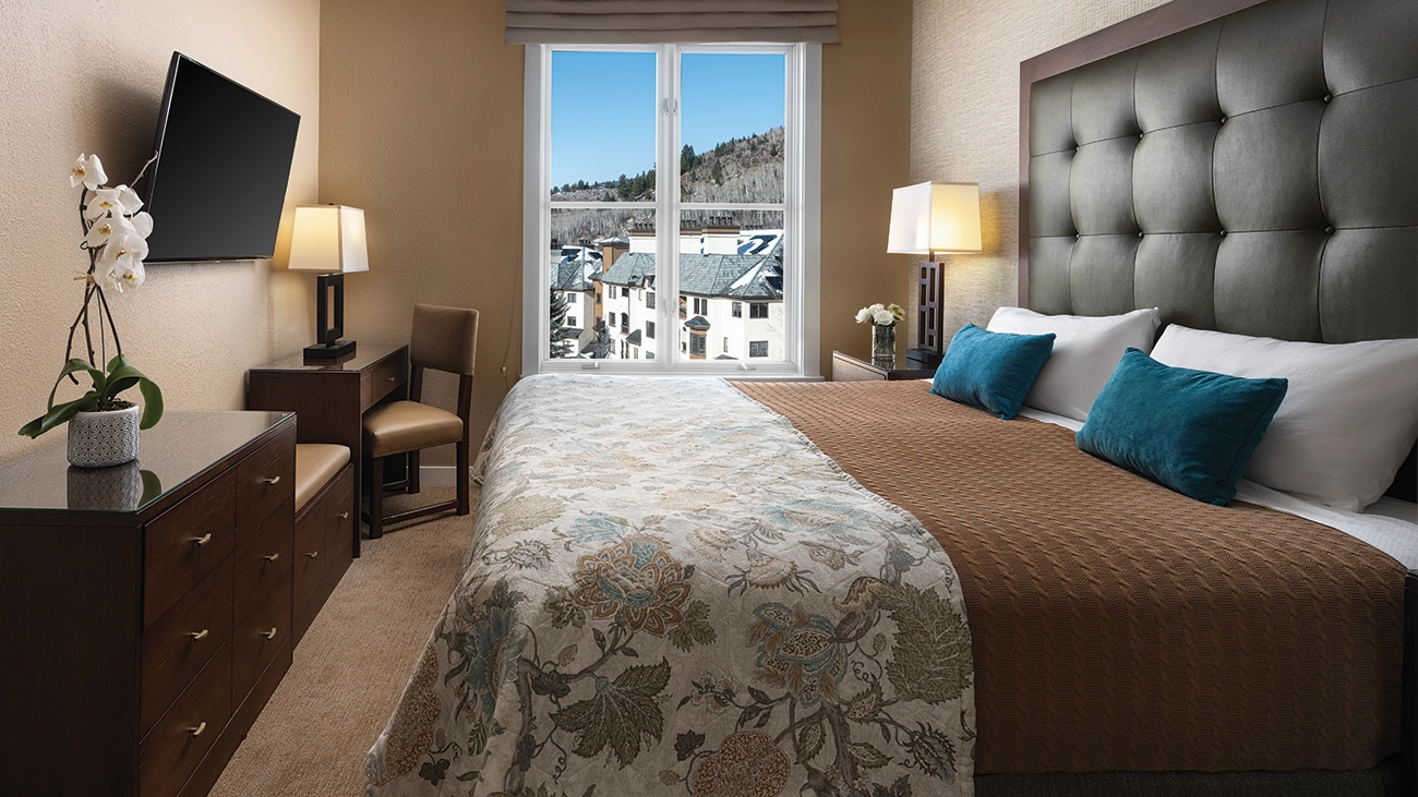 Villa bedroom with a mountain view