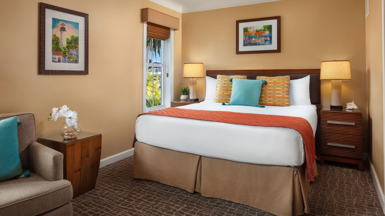 Resort bedroom with decorative pillows