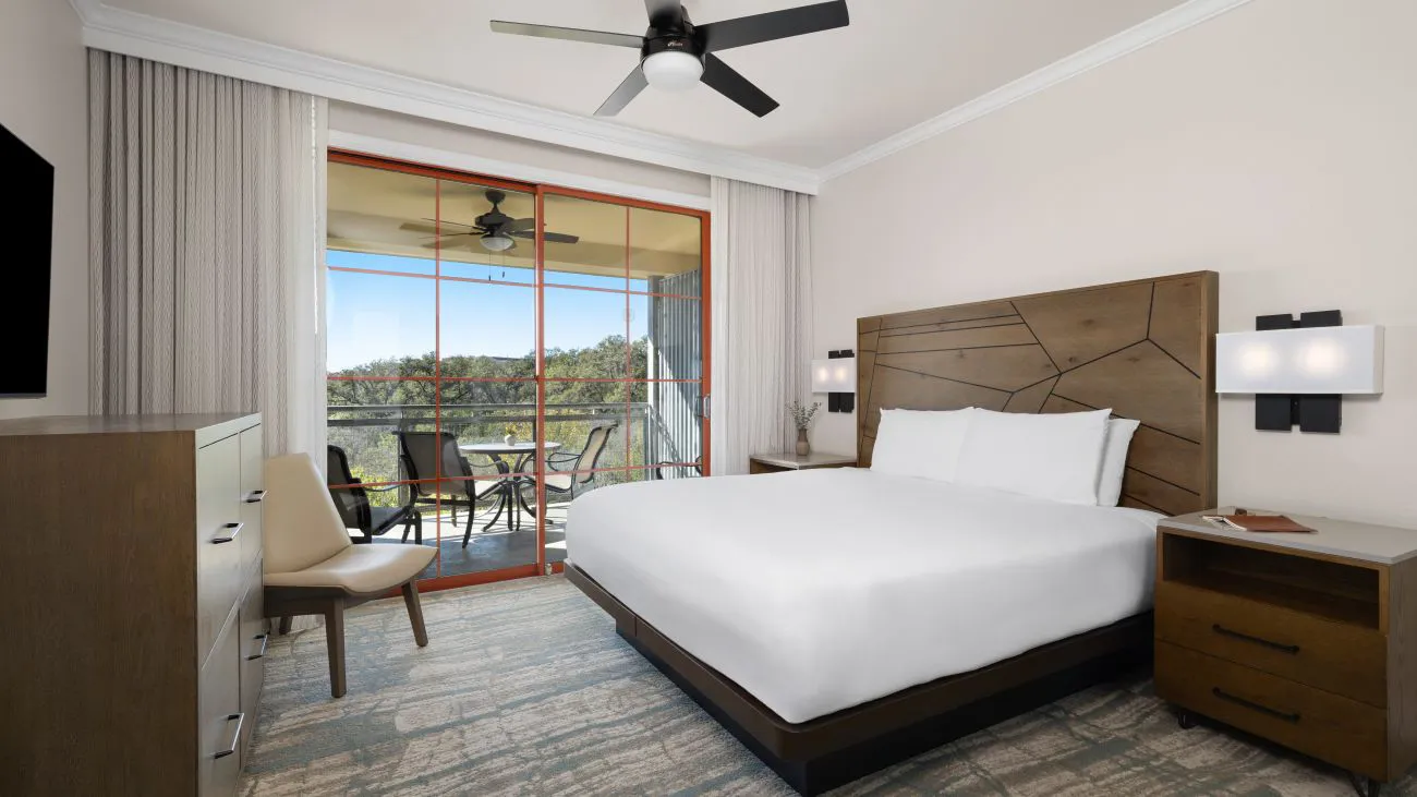Primary bedroom of the 1- and 3-bedroom villa at Wild Oak Ranch